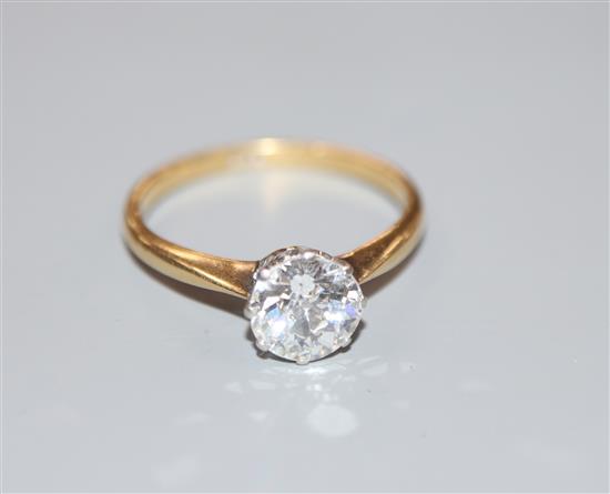 An 18ct and solitaire diamond ring, the stone weighing approximately 1.10ct